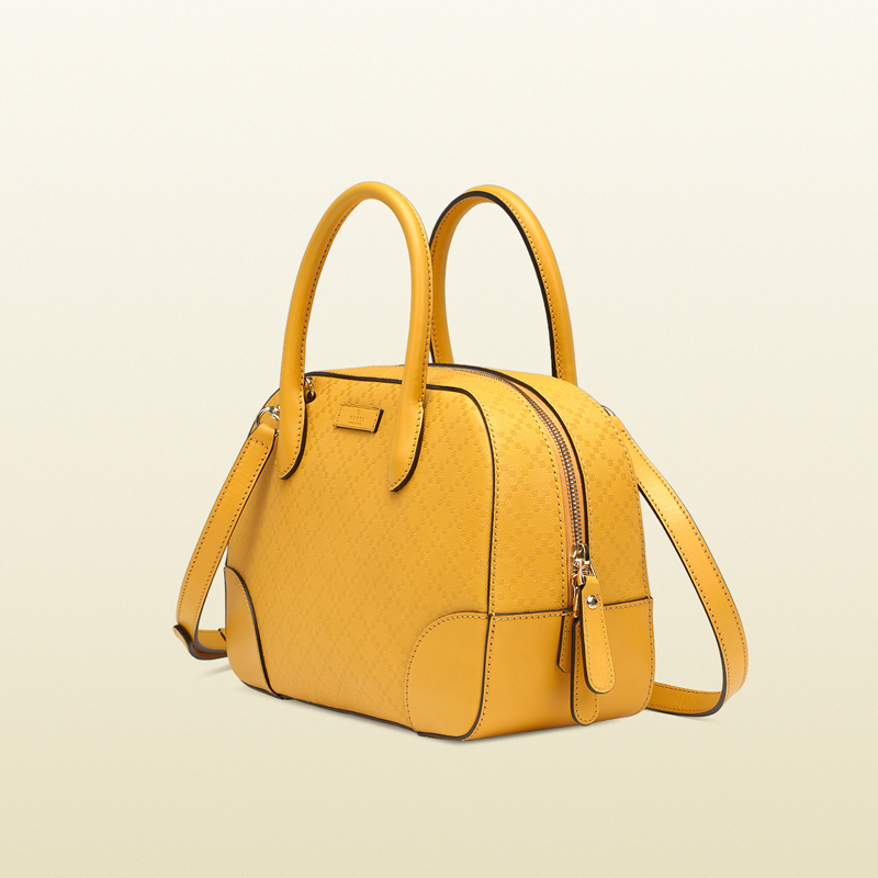 Bright diamante leather top handle bag