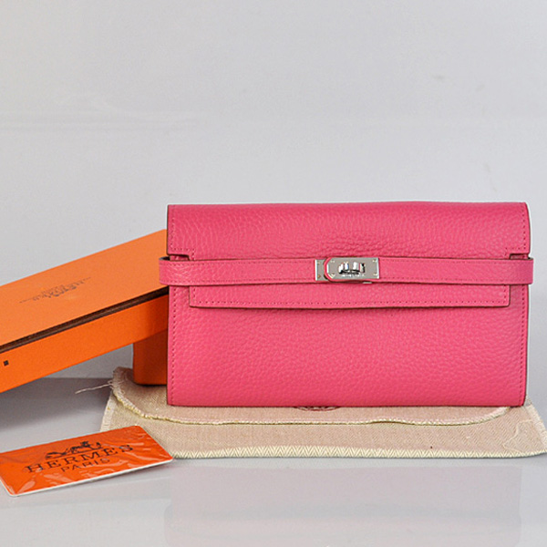 Hermes Kelly Wallet clemence leather in Peach