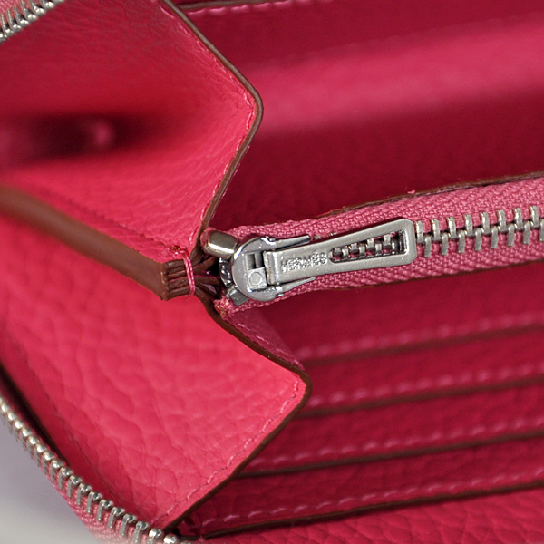 Hermes Evelyn Wallet clemence leather in Peach